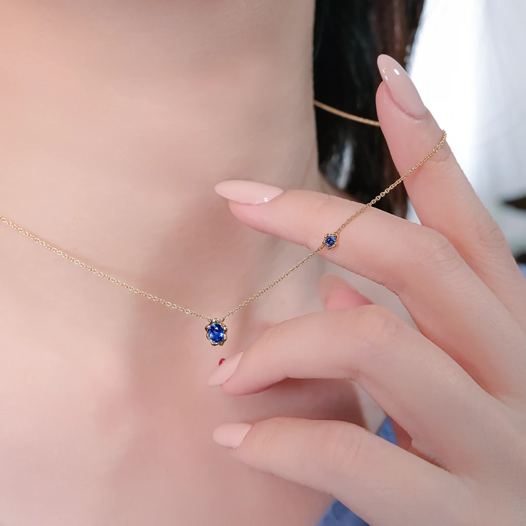 Melted gold blue sapphire necklace
